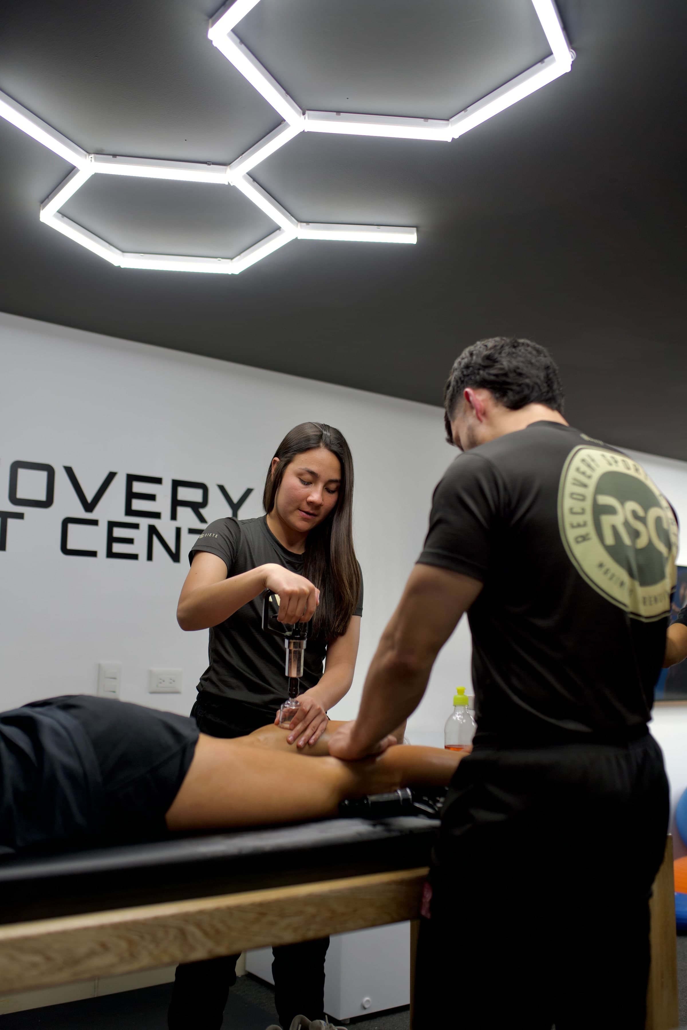 A practitioner performing soft tissue therapy on a patient's arm at Riverstone Health & Movement in Toronto