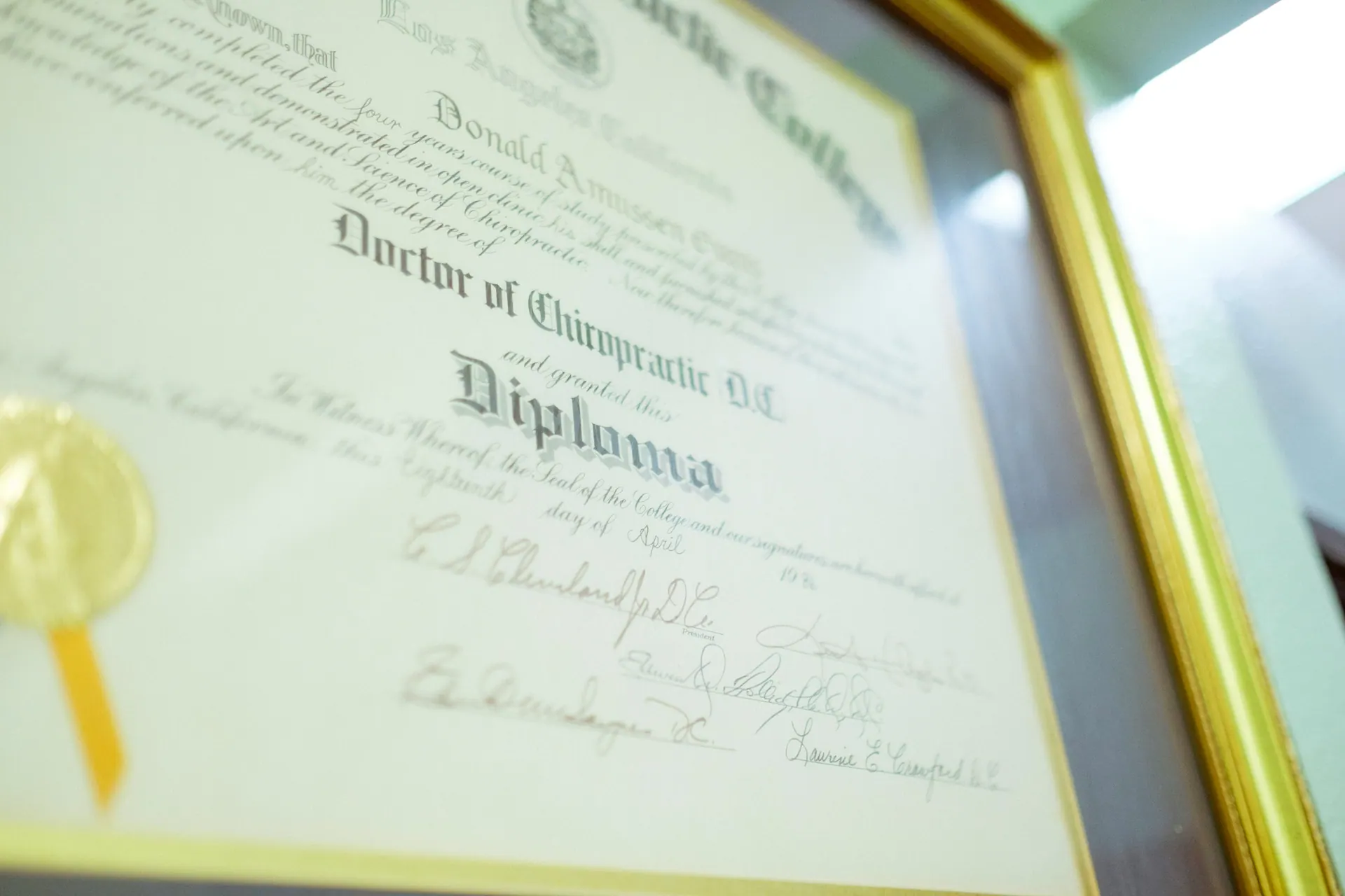 A framed chiropractic diploma