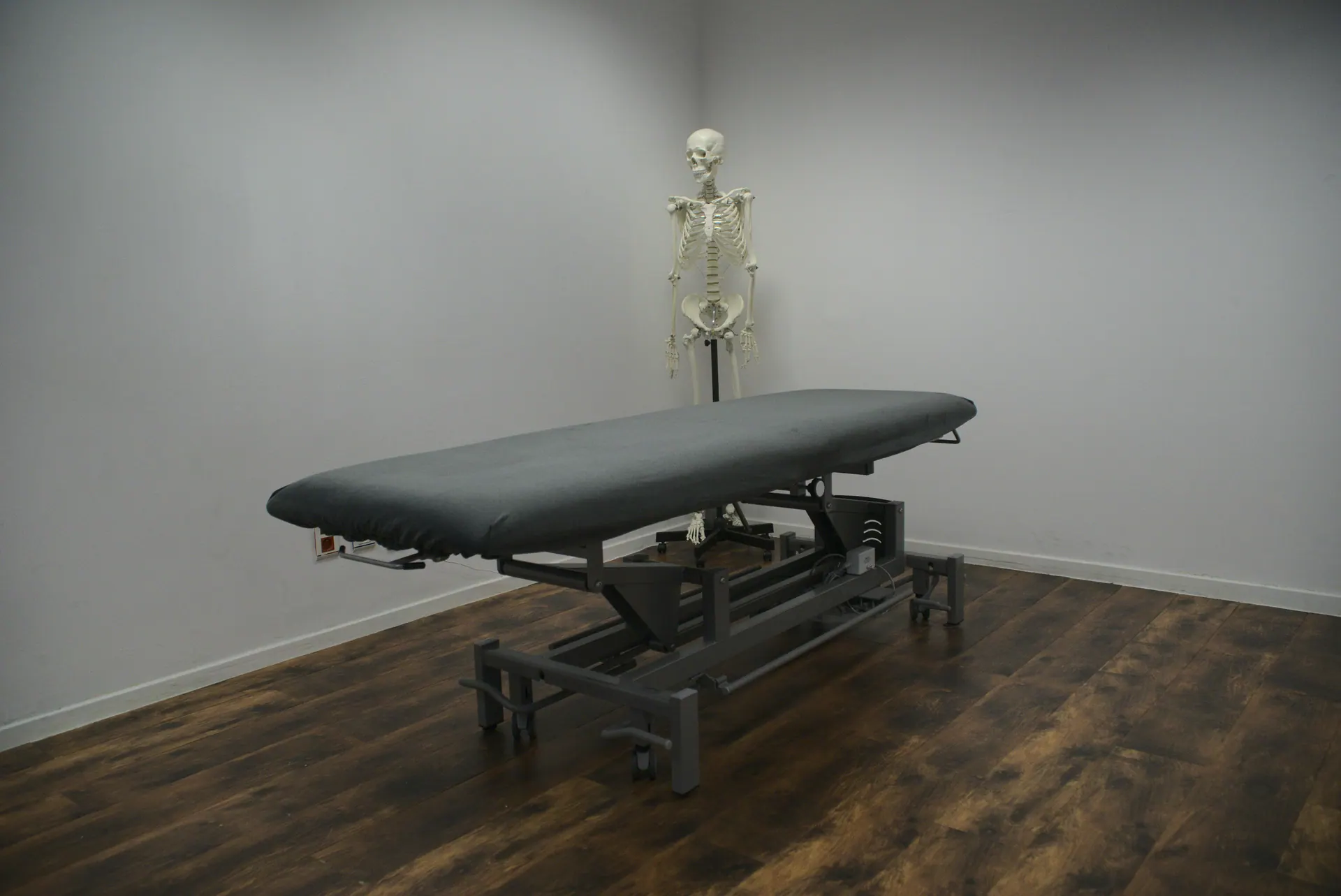 A treatment table in a private clinic room